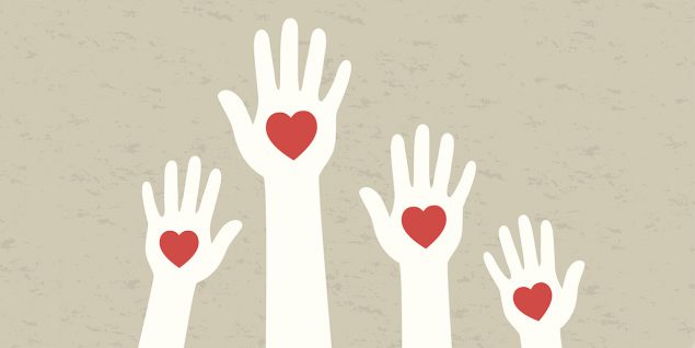 heart-hand Illustration of hands held up with hearts in the middle of each one.